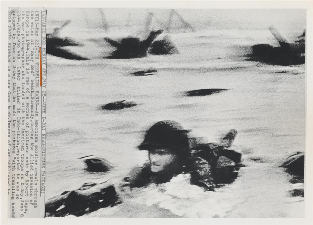 (ROBERT CAPA) (1913-1954) D-Day Invasion, Omaha Beach, Normandy Coast.